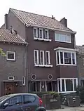 Dubbel woonhuis; pand met boven- en benedenwoning