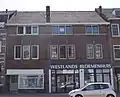 Dubbel winkel-woonhuis in expressionistische stijl