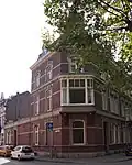Woonhuis met achterbouw (stallencomplex) in eclectische stijl
