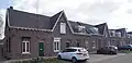 Complex van twaalf geschakelde woningen