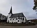 Sint-Laurentiuskerk en vrijthofsmuur in Mackenbach