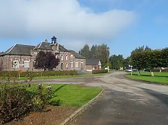 Gemeentehuis en school van Illois