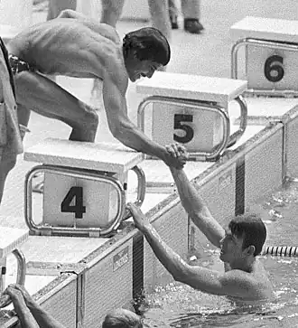 Heidenreich (rechts) en Mark Spitz tijdens de Olympische Zomerspelen 1972