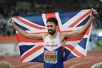 Martyn Rooney viert zijn overwinning op de 400 m tijdens de EK van 2016, Amsterdam.