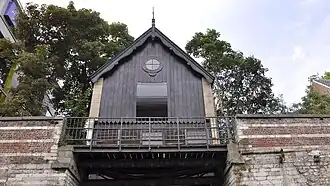 Het Spuihuis vanaf de Dijle