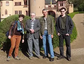 Aleksandr Ponomarenko (2e van links)