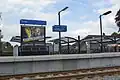 De stationsaanduiding