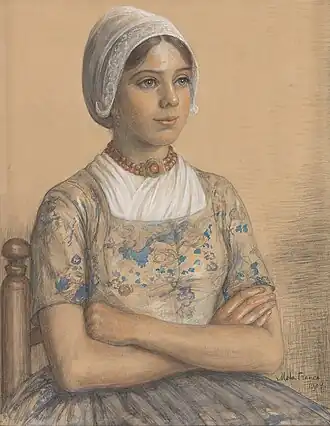 Meisje in Oud-Zaanse dracht, 1907. Zij heeft een collier van bloedkoraal om