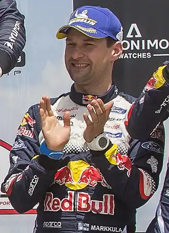 Markkula op het podium bij de rally van Portugal in 2018