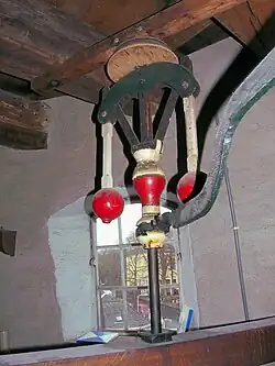 Regulateur van het maalkoppel met blauwe stenen