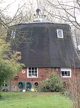 De Nijverheidspolder met rechtsachter nog net zichtbaar de wiek van de spinnenkop