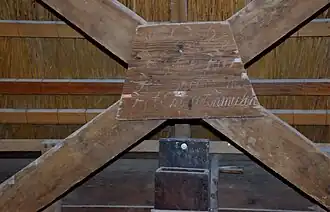 Veldkruis met opschrift: 1793 + '"`UNIQ--postMath-00000001-QINU`"' + Heeft de Heer + H + Bregtezemte Het Erste Latenmalen