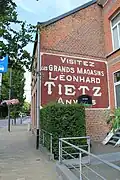 Muurreclame voor Grands Magasins Léonhard Tietz