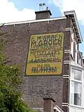 Muurreclame in Overgangsarchitectuur stijl