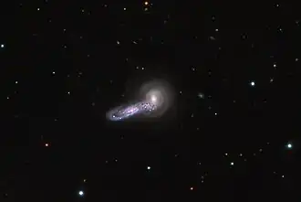 NGC 5545 (link) en NGC 5544