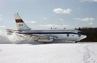 Boeing 737-100 in NASA kleuren tijdens wintertests, 1985