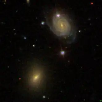 NGC 3473 (rechts) en NGC 3474