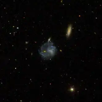 NGC 5511 (rechtsboven)