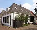 Gepleisterde stadsboerderij[1]