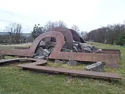 Natuurkracht, cortenstalen platen en grote stenen, Amsterdam-Zuidoost.