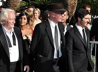 Regisseur Jacques Audiard (midden) met hoofdrolspelers Niels Arestrup (links) en Tahar Rahim