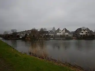 Zicht op woningen van Nieuweland vanaf de Sweelincklaan