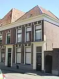 Woonhuis, met poortdoorgang