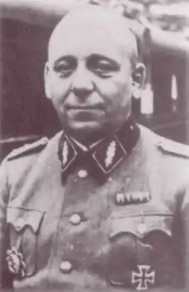 SS-Standartenführer Nikolaus Heilmann met het Duitse Kruis in goud, 1943.