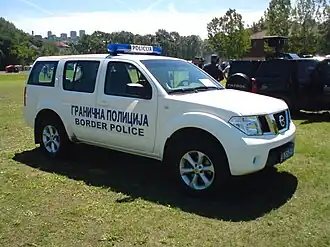 De Servische grenspolitie.