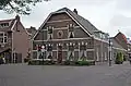 Woonhuis, winkel (voormalige boerderij)