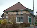 Woninggroep Nuinhof: 2 arbeiderswoningen