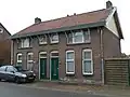 Woninggroep Nuinhof: 2 arbeiderswoningen