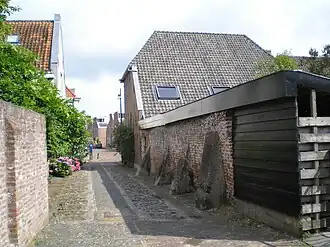Oliemolen met op het eind de Nonnenstraat