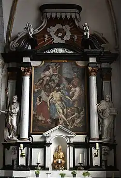 Het rechterzijaltaar met een schilderij van Hendrick de Clerck