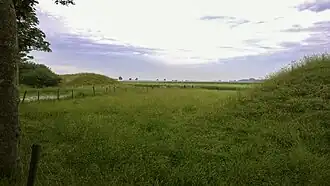 Doorkijkje naar de Waardsterpolder door een voormalige coupure in de (Ooster) Waarddijk