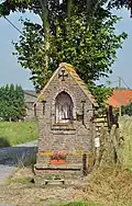 Pijlerkapel bij de ingang van een hoeve