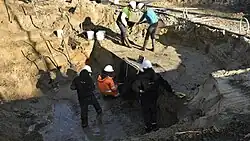 Het blootleggen van een waterput