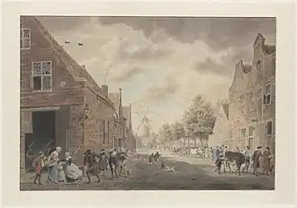 Op de achtergrond de Pinkmolen op de fundering resten van de Pijntoren in de Westelijke stadsmuur