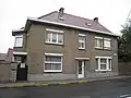 Site met woning en bedrijfsgebouwen
