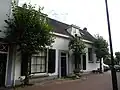 Gekoppeld woonhuis met nr. 64