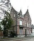Herenhuis in neotraditionele stijl gedateerd 1897