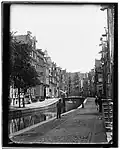 De brug in 1890 vastgelegd door Jacob Olie met daarachter de buis