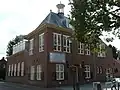 Voormalig raadhuis in Traditionalisme stijl