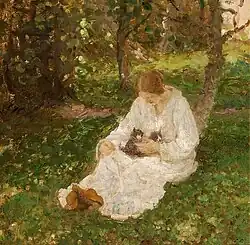 Een jonge vrouw met twee katjes