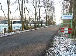 Plaatsnaambordje vanaf de richting Stroobos