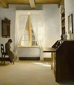 Interieur met lezend meisje