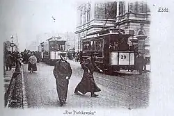 Oude ansichtkaart van een van eerste tramrijtuigen in Łódź, motorwagen van fabrikant Herbrand. Piotrkowska straat.