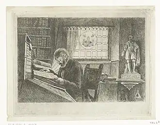 Frederik Verachter aan zijn bureau in het archief (door Philippe-Jacques van Bree)