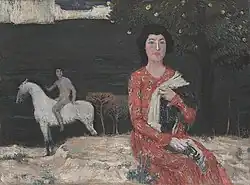 Vrouw en ruiter bij het meer