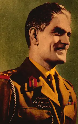 Een kleurenfoto van Abdul Karim Qasim